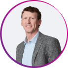 Dr Botson wearing a gray blazer