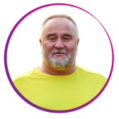 Man with beard wearing yellow shirt